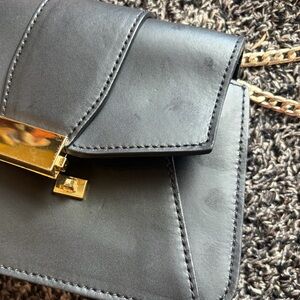 Elegant Black Leather Bag with Gold Accents